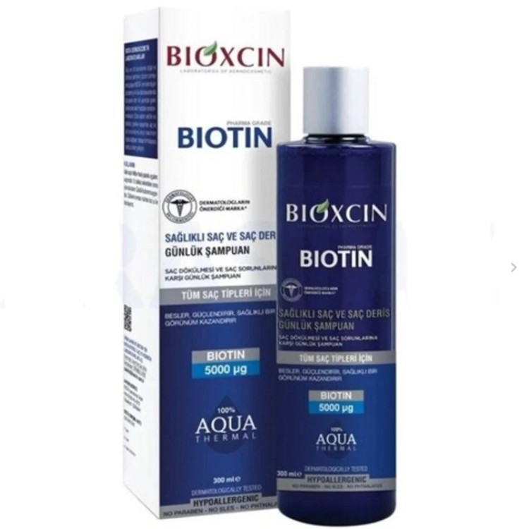 شامپو ضد ریزش مو بیوکسین مدل بیوتین حجم 300 میلی لیترBioxin hair shampoo biotin model volume 300 ml